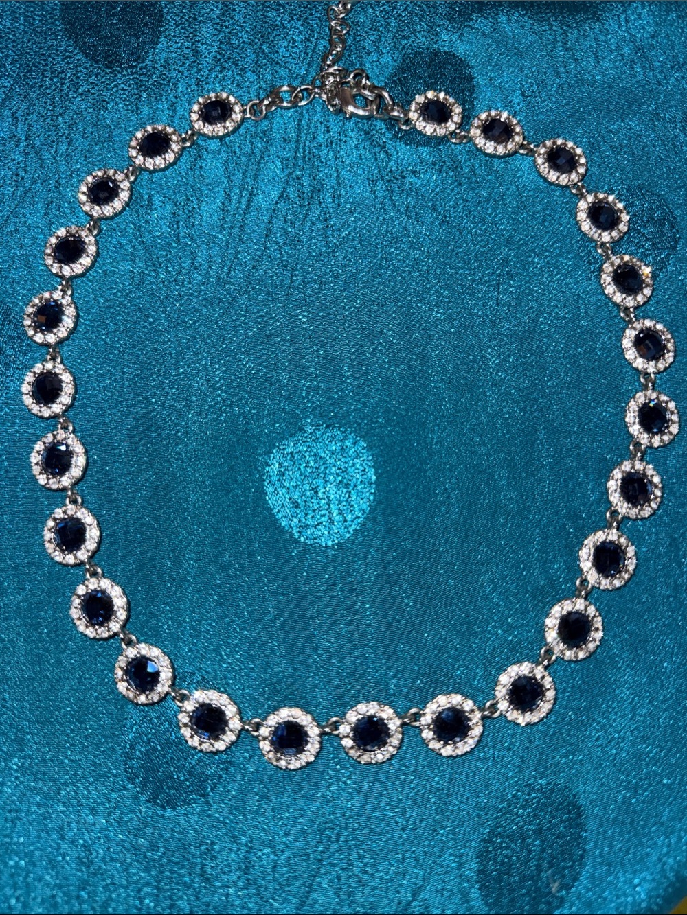 Elegant Silver Necklace with Dark Blue Gem Accents